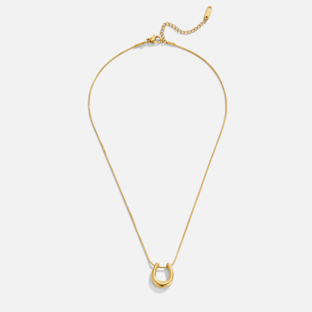 Collar de herradura dorada
