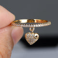 Anillo apilable con dije de corazón pavé