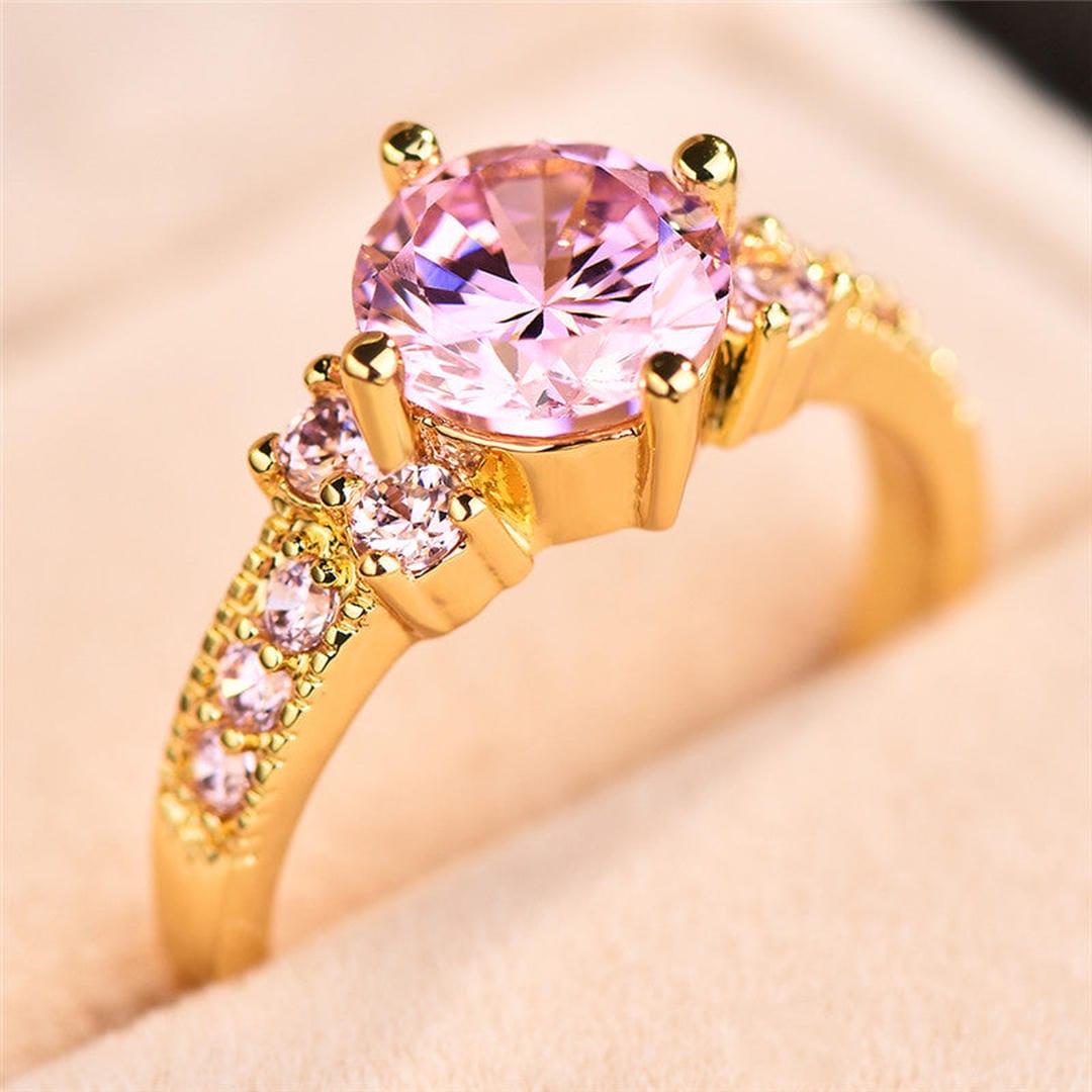 Anillo de acento solitario redondo real