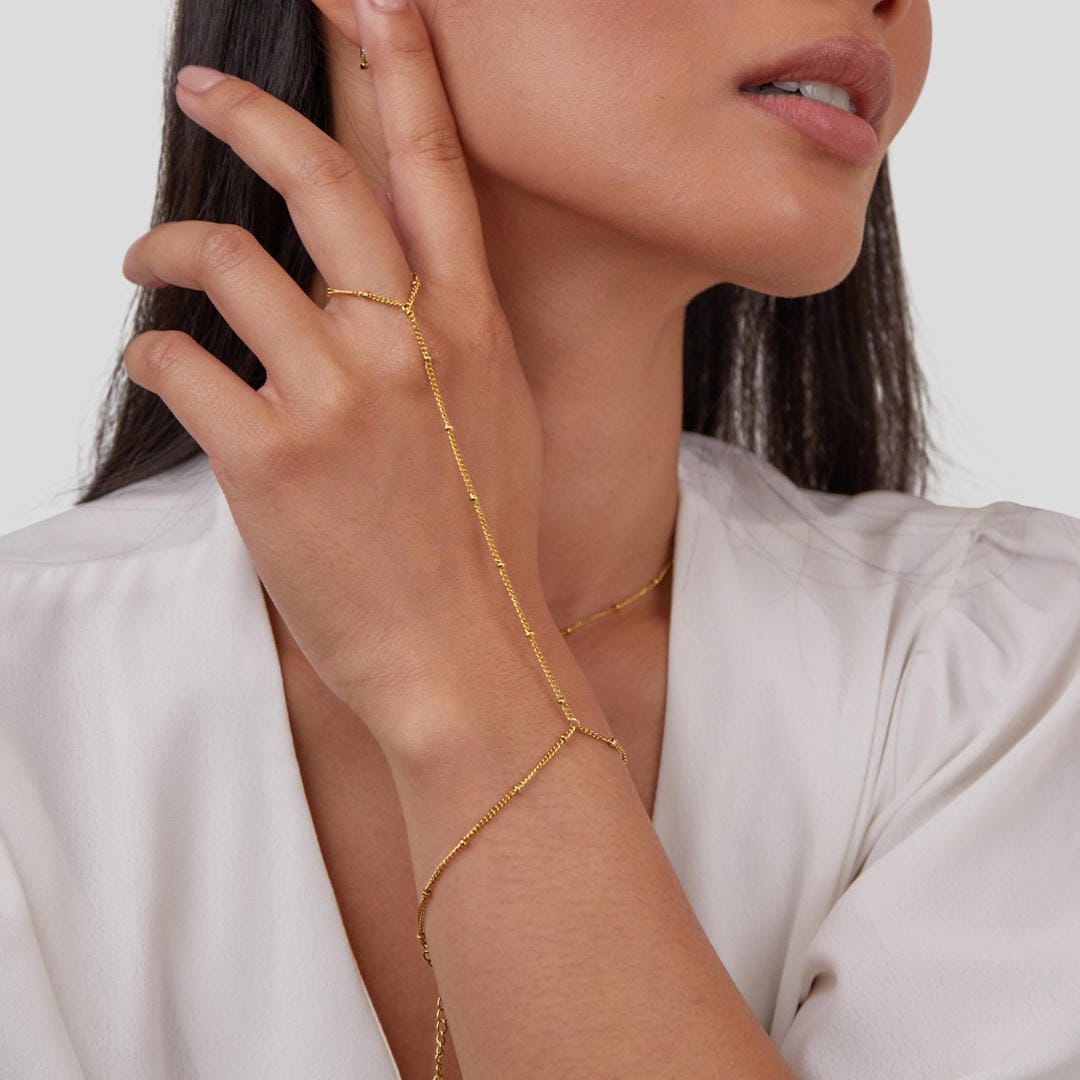 Pulsera de cadena de mano elegante dorada