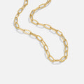 Collar con dije de clip de papel en oro de 18 quilates