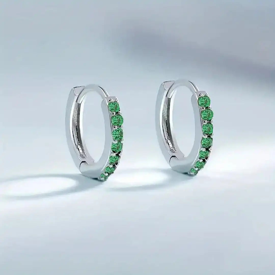 Pendientes de gota dorados inspirados en la costa