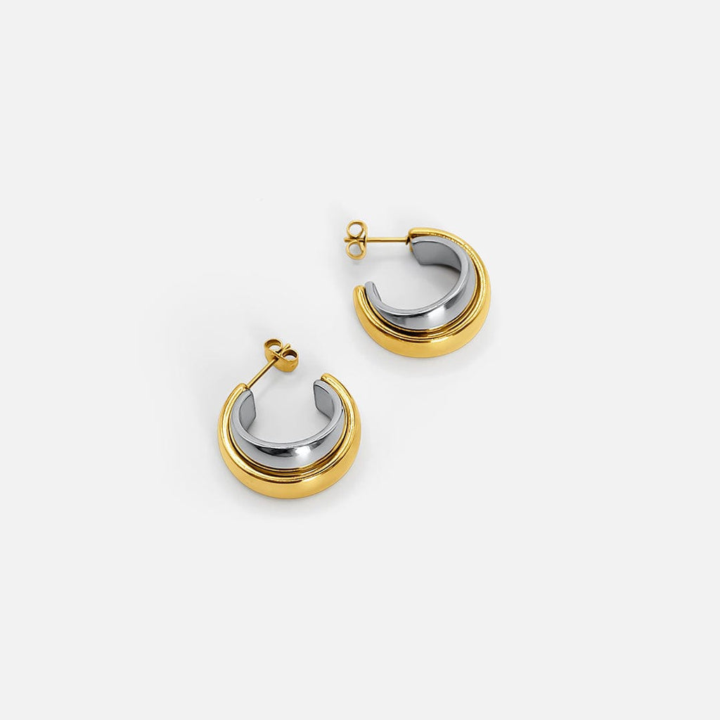 Elegantes pendientes de oro y plata de dos tonos