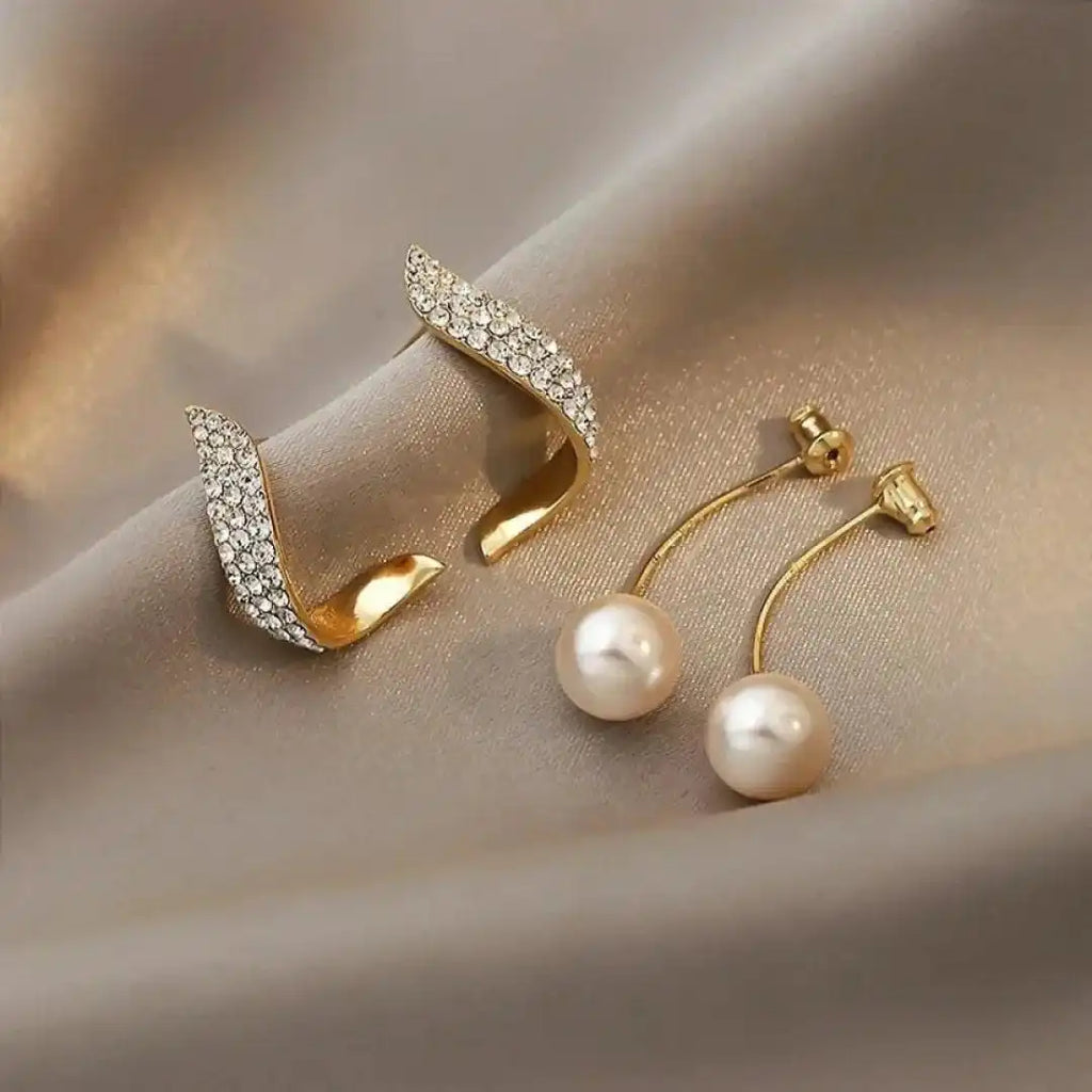 Elegantes pendientes de oro con perla colgante