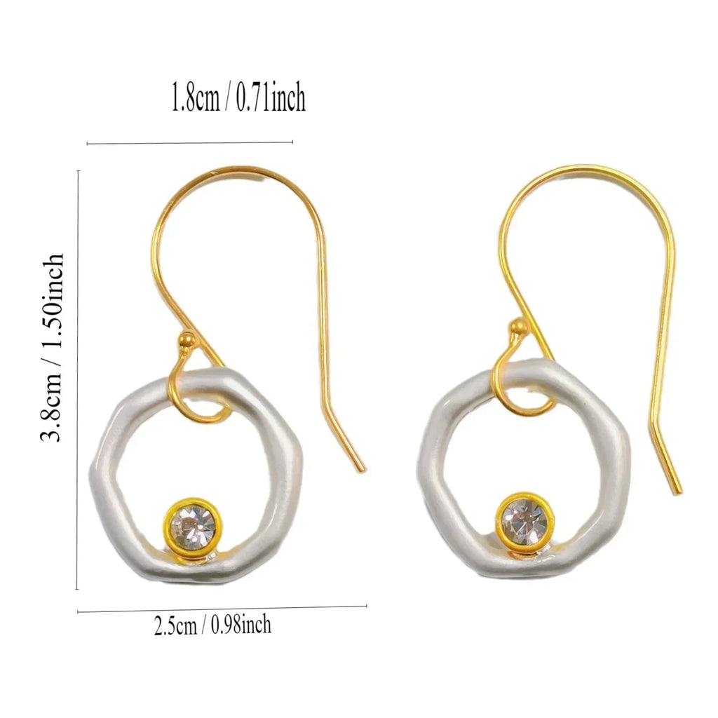 Aretes vintage de circonita de oro y plata