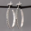 Pendientes de aro plateados y elegantes