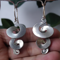 Pendientes de espiral vintage plateados