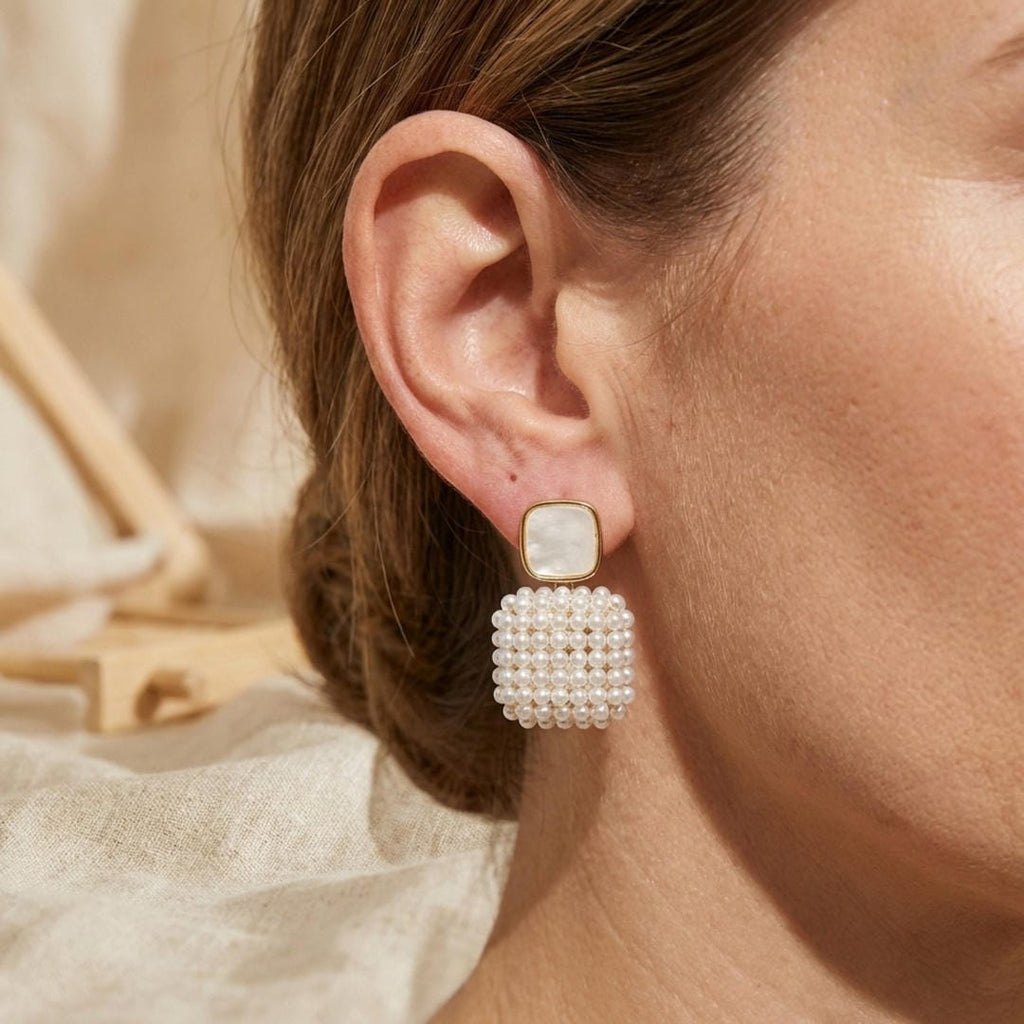 Pendientes largos de perlas con cuentas