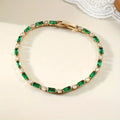 Pulsera de tenis de esmeraldas y baguettes