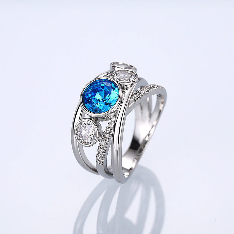 Anillo llamativo de piedra azul plateada