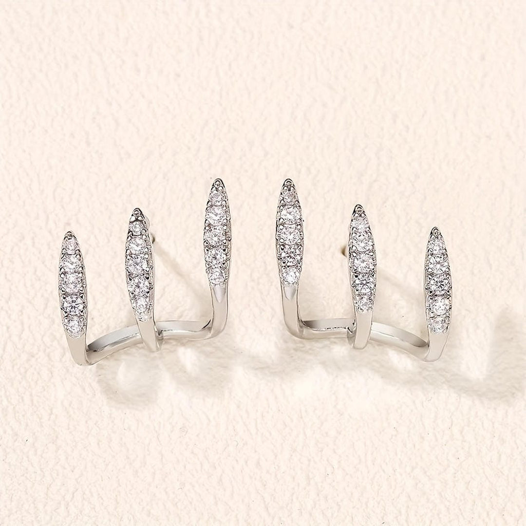 Elegantes aretes de rinocerontes de tres garras