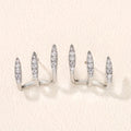 Elegantes aretes de rinocerontes de tres garras