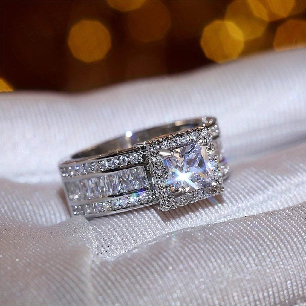 Anillo llamativo Halo Princesa Baguette