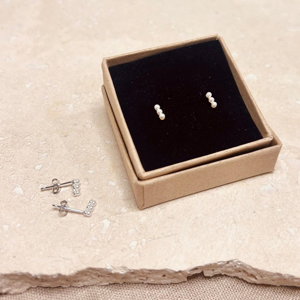 Elegantes pendientes de perlas trío