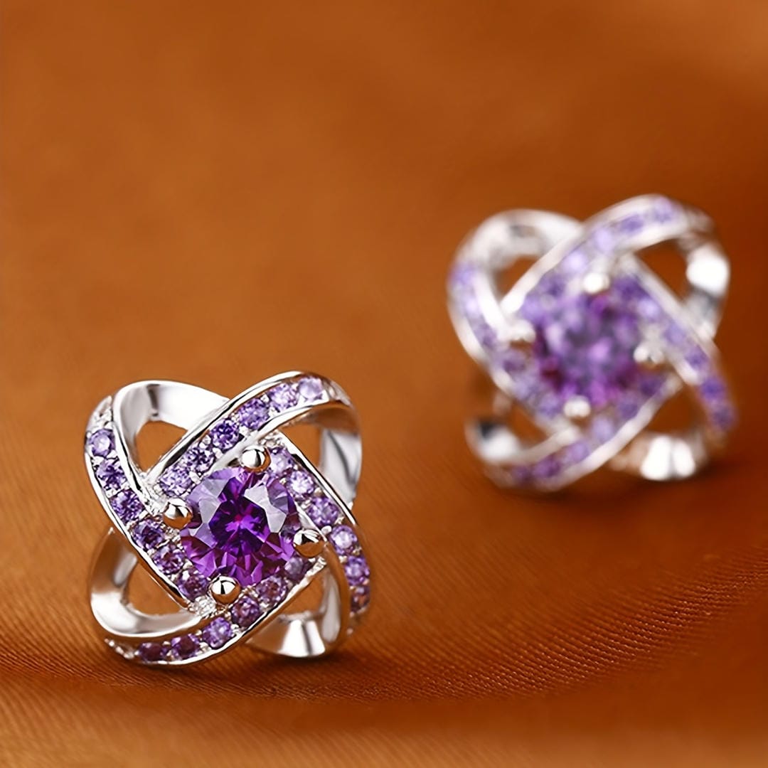Pendientes de trébol de cristal floral en espiral