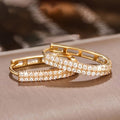 Pendientes circulares elegantes de circonita