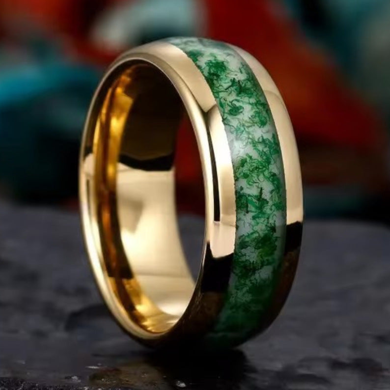 Anillo con incrustaciones de oro verde oscuro