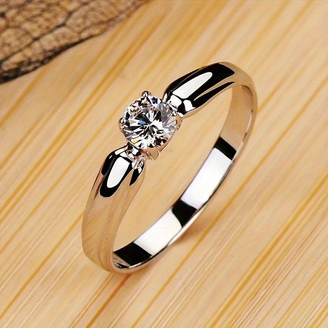 Anillo de compromiso de solitario redondo clásico