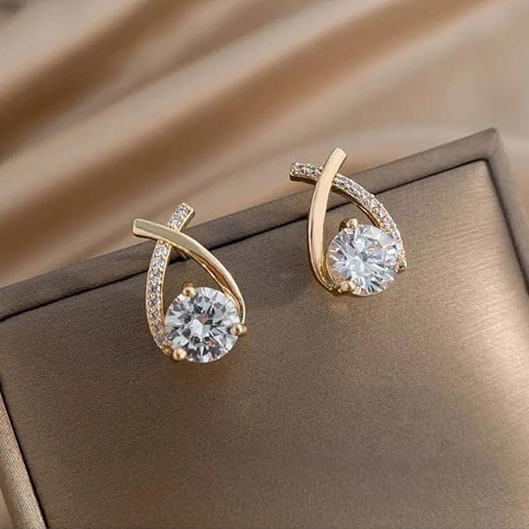 Pendientes de circonita de oro en forma de cruz