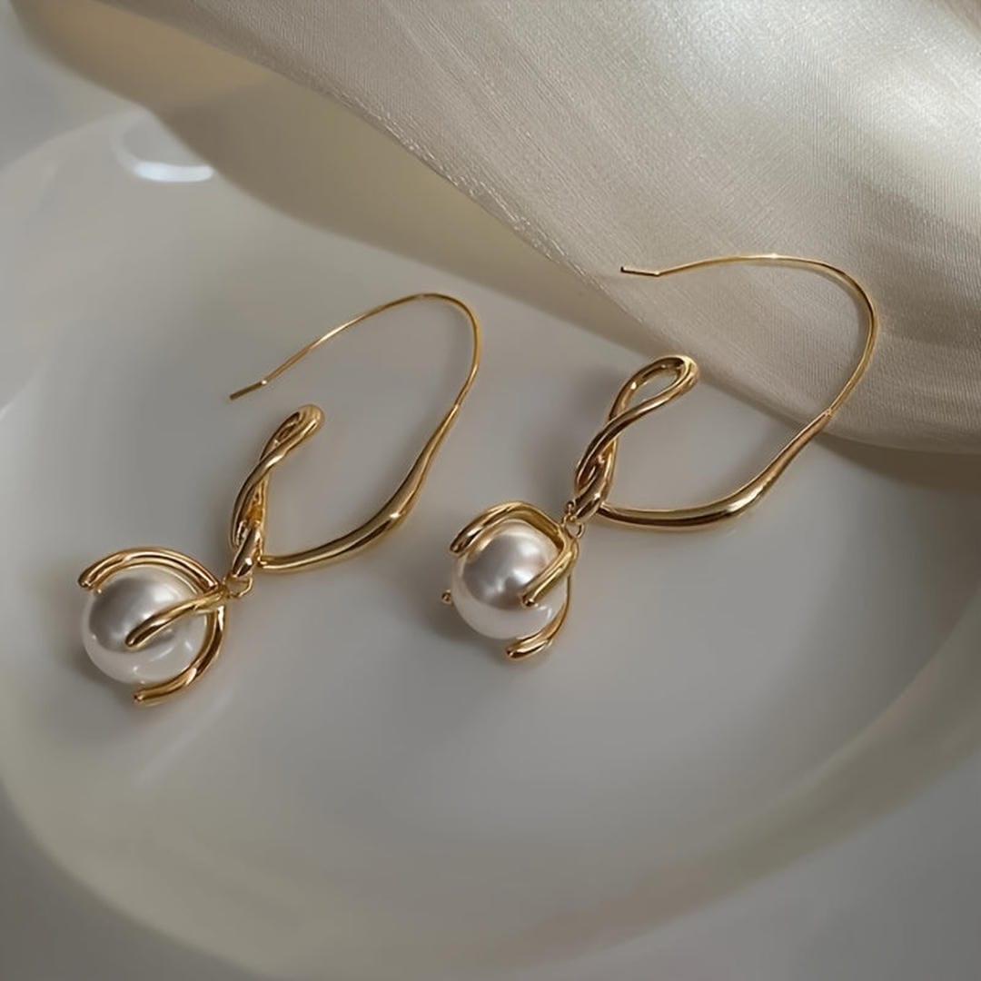 Pendientes colgantes de perlas en espiral
