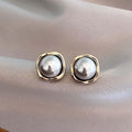 Pendientes elegantes de perlas negras