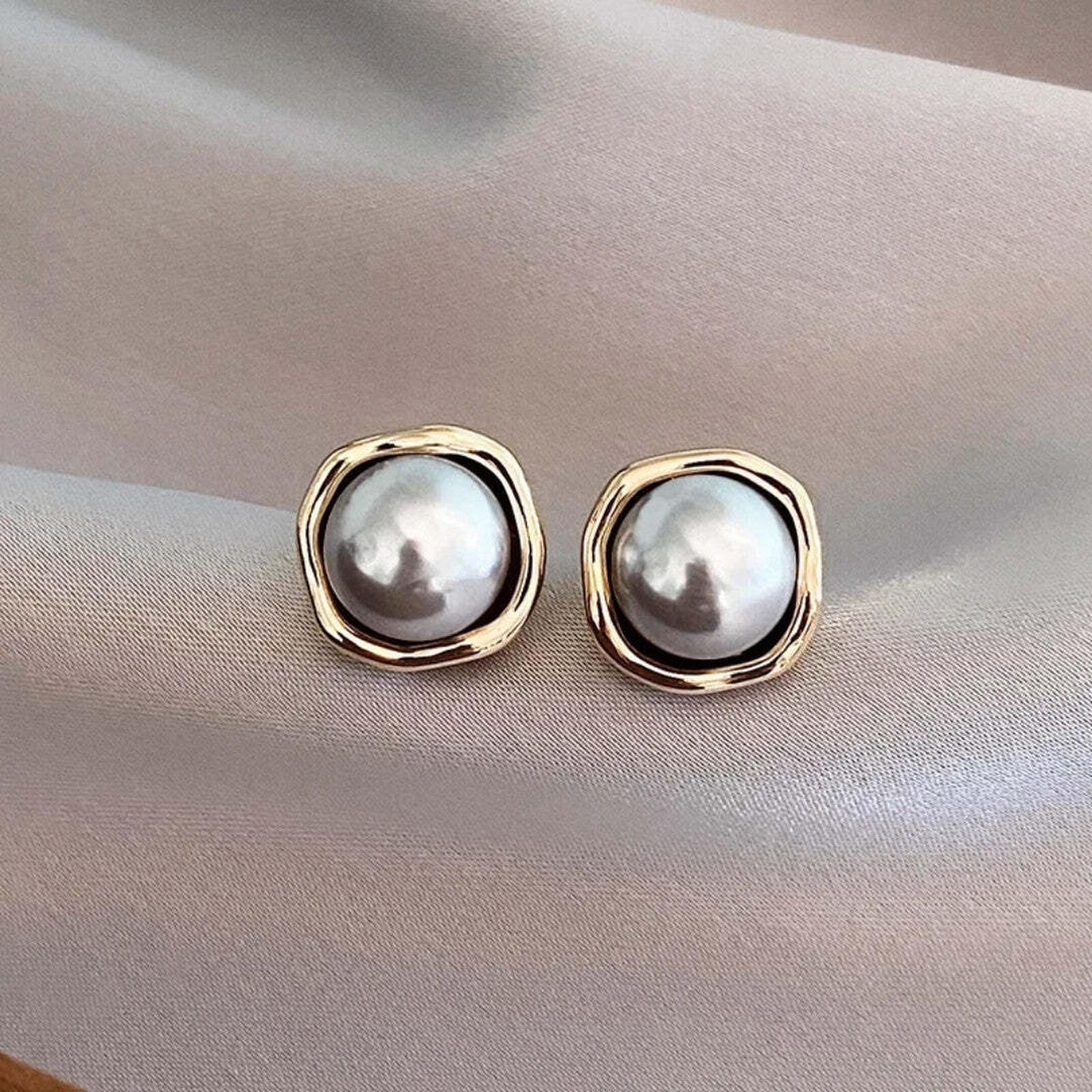 Pendientes elegantes de perlas negras