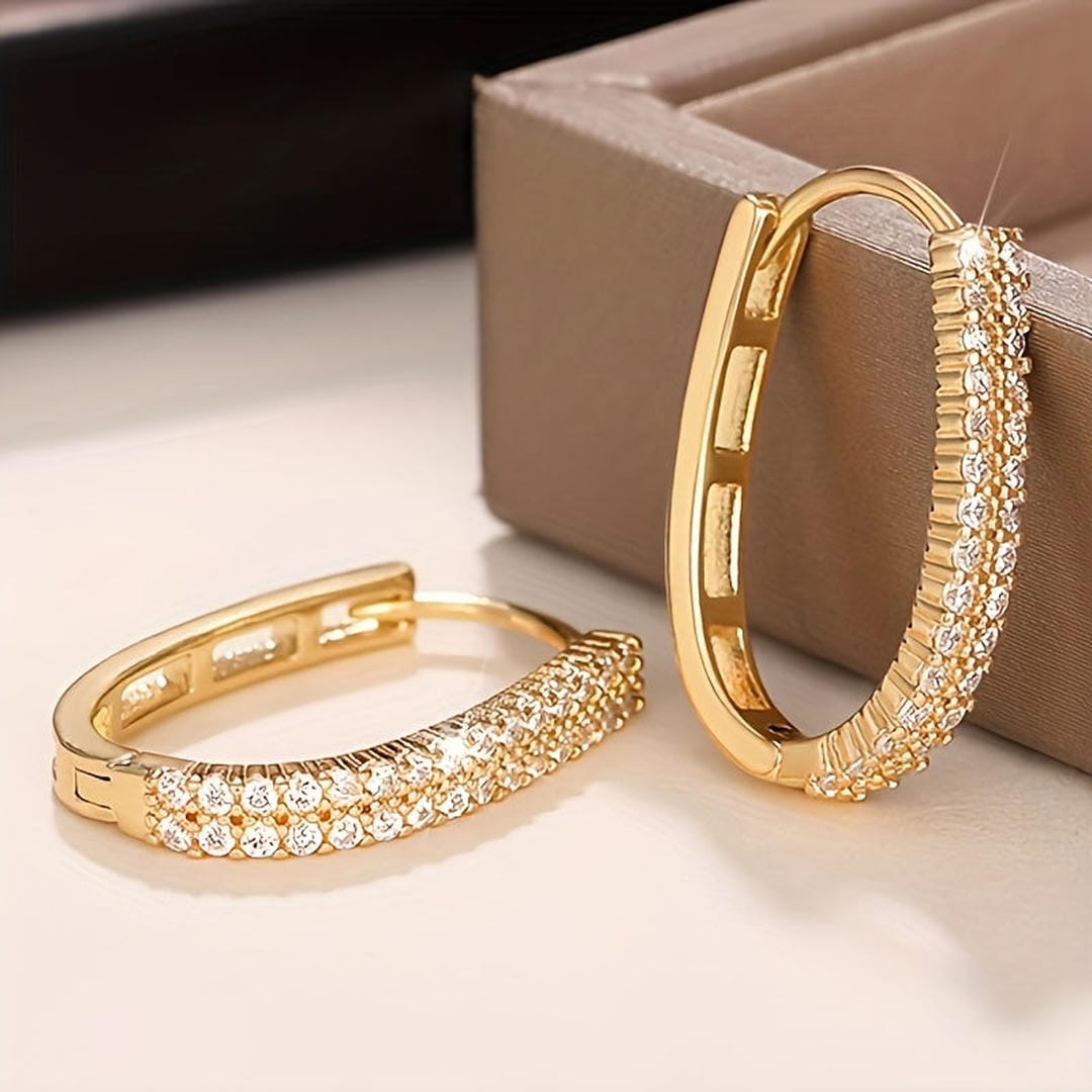 Pendientes circulares elegantes de circonita