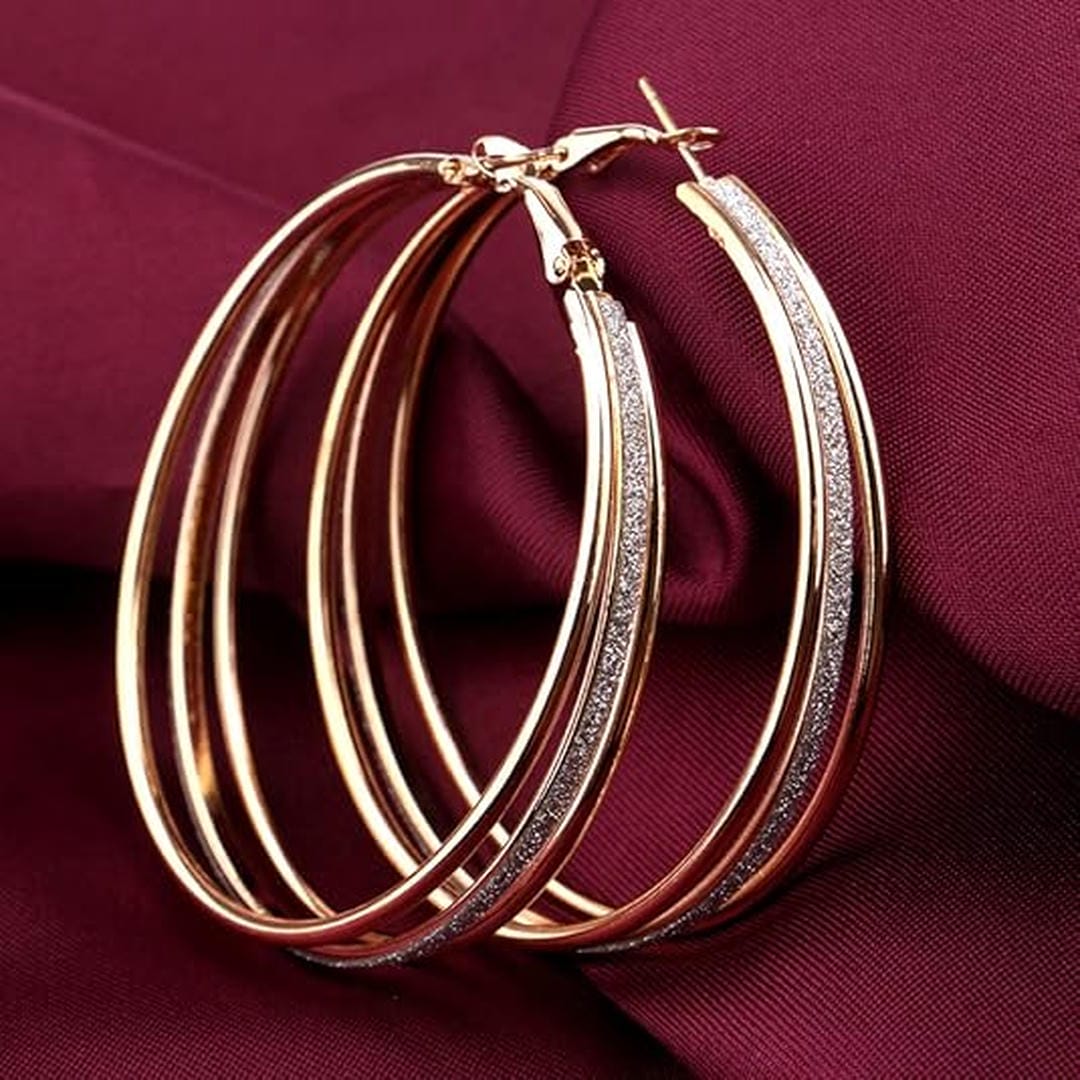 Pendientes de aro retro dorados