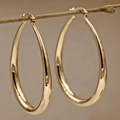 Elegantes aretes de aro dorados
