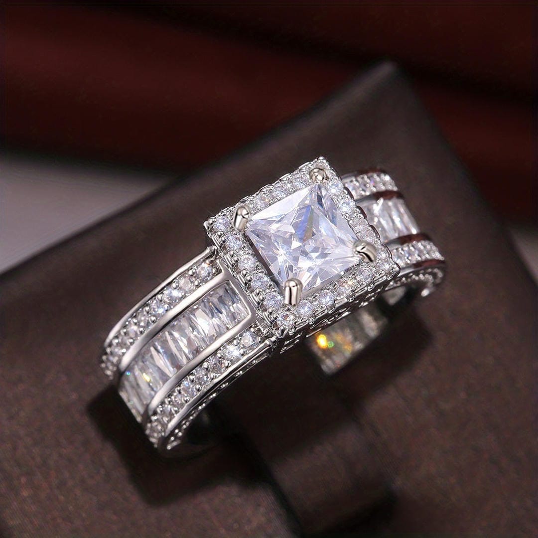 Anillo llamativo Halo Princesa Baguette
