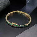 Pulsera de tenis clásica de oro con esmeraldas