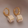 Pendientes colgantes cubo dorado