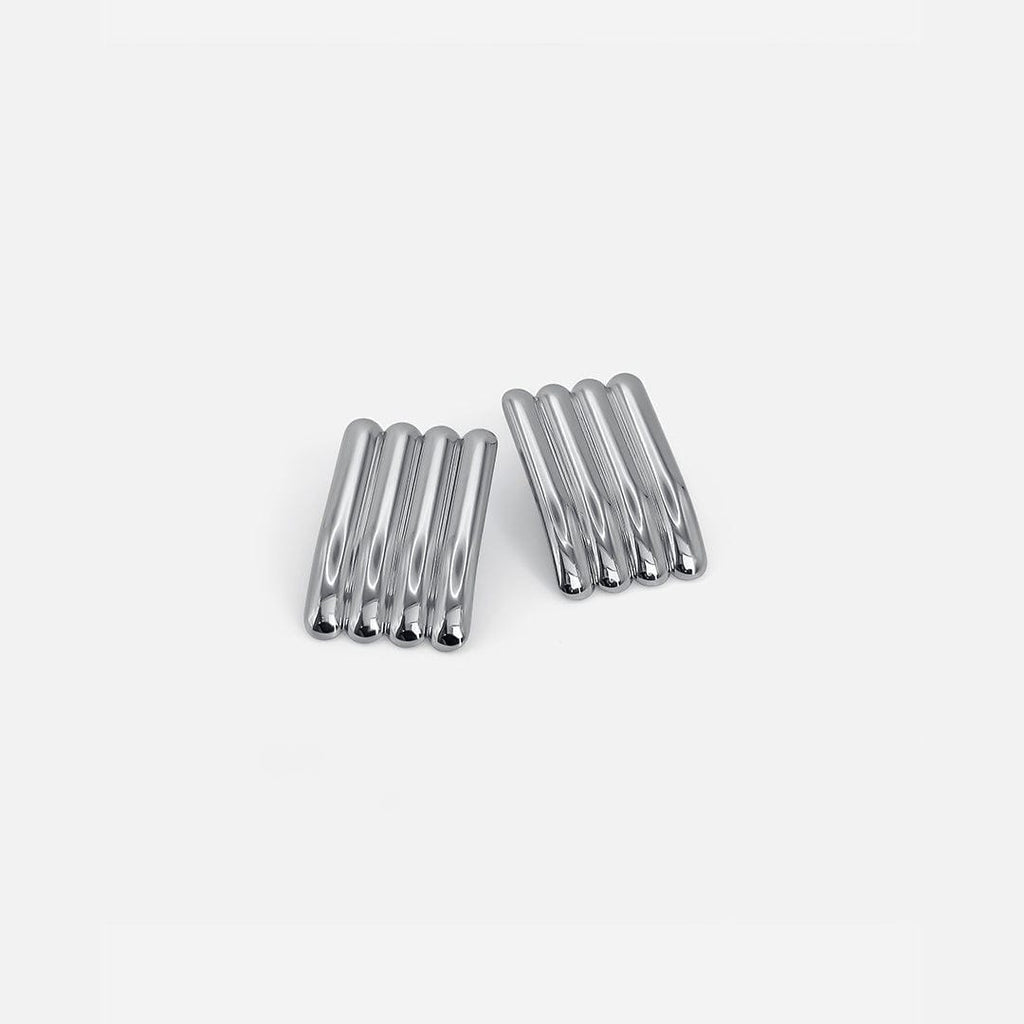 Pendientes largos acanalados de plata artística