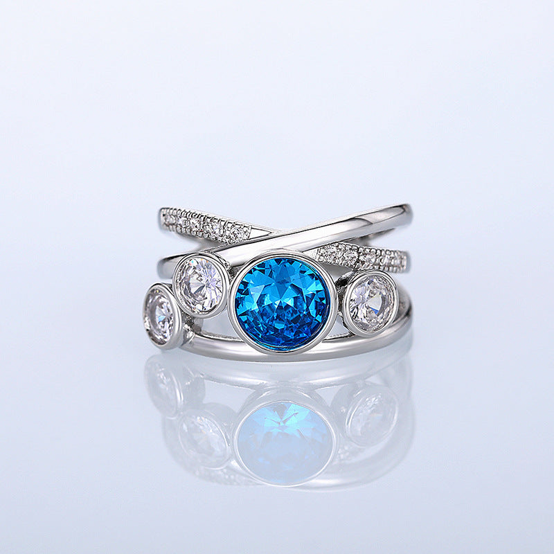 Anillo llamativo de piedra azul plateada
