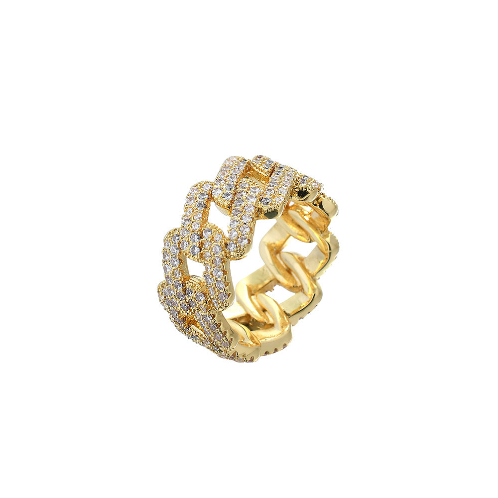 Elegante anillo con incrustaciones de circonita dorada y plateada