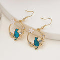 Pendientes colgantes de gato floral y estrella