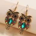 Pendientes colgantes vintage de búho con gema