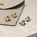 Micro-aros de perlas con flor