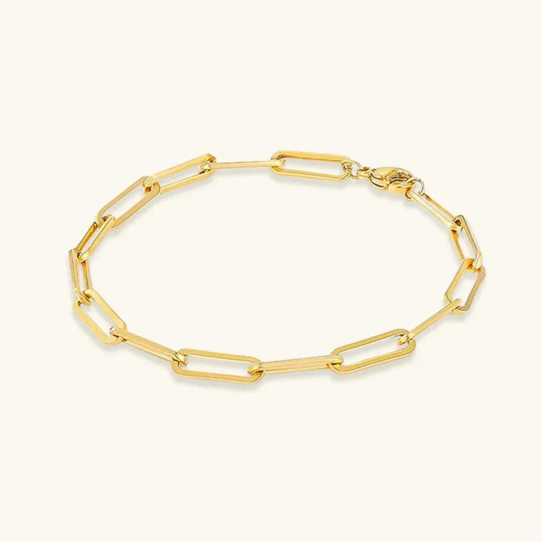 Elegante pulsera de clips dorados