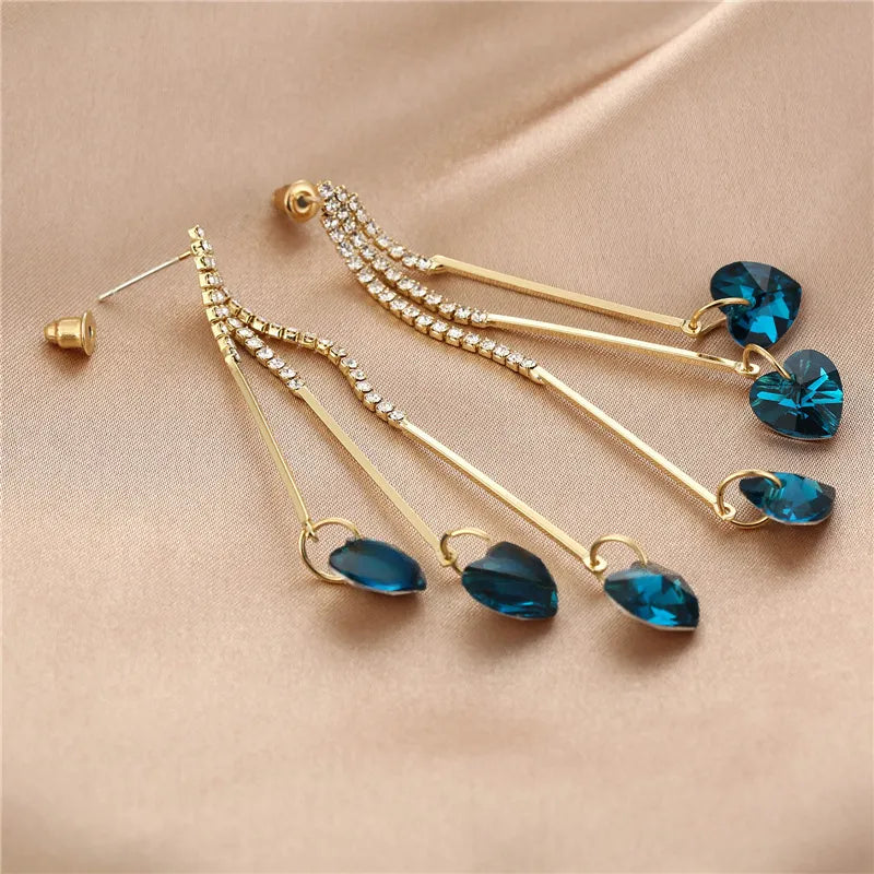 Elegantes pendientes de gota de lluvia de corazón de cristal azul