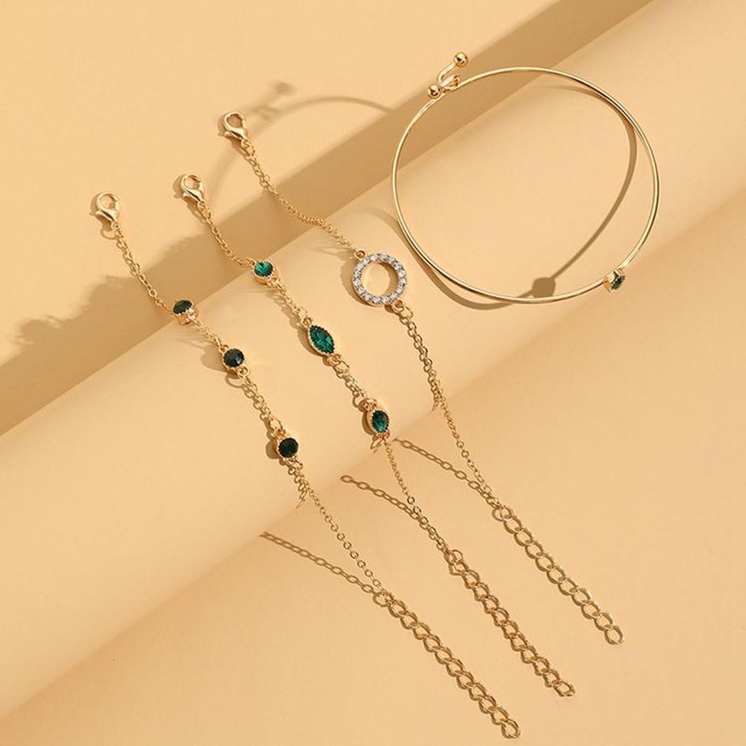 Juego de pulseras de oro con cristal esmeralda