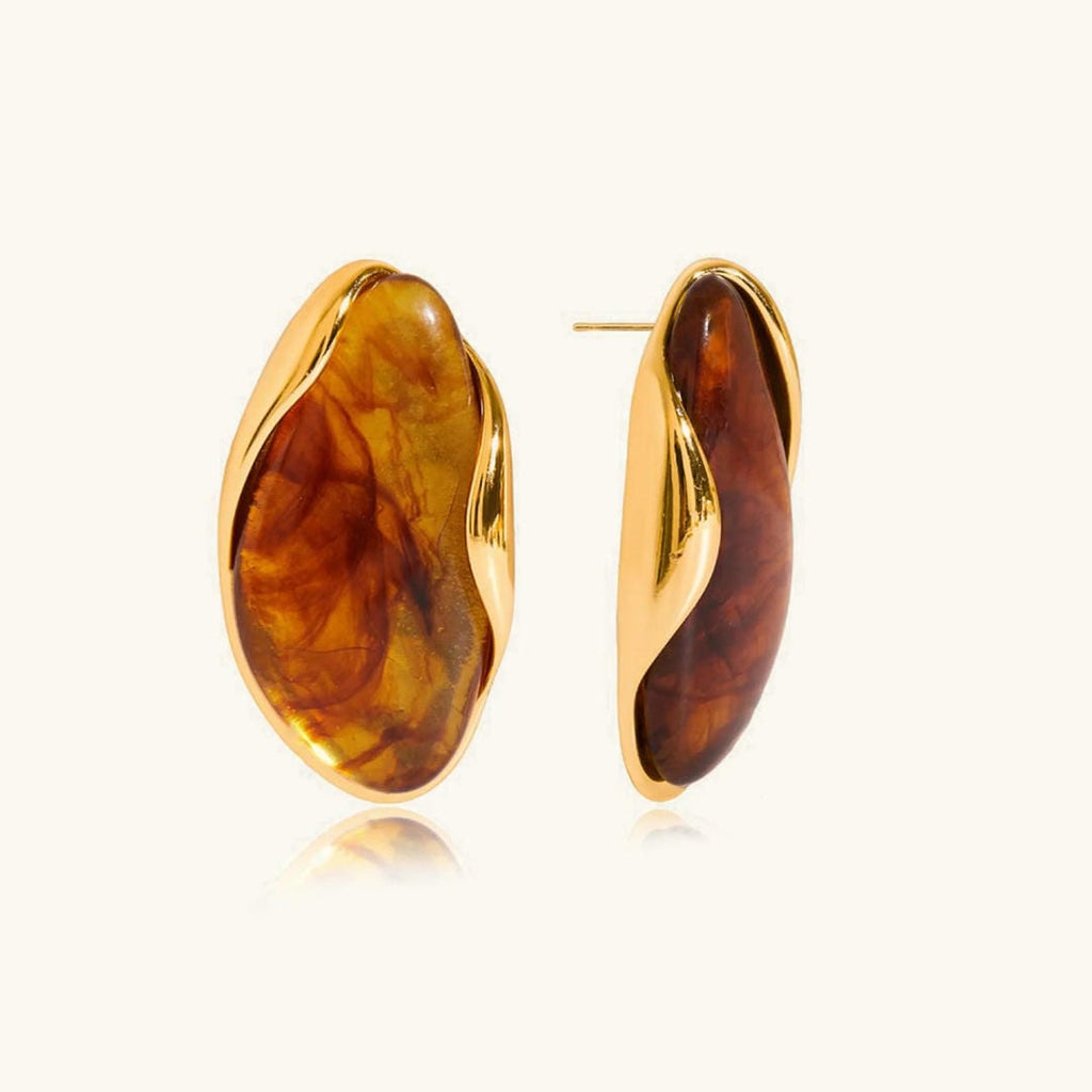 Pendientes atemporales de piedras preciosas pulidas