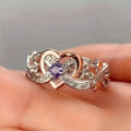 Anillo de oro y plata con corazón violeta