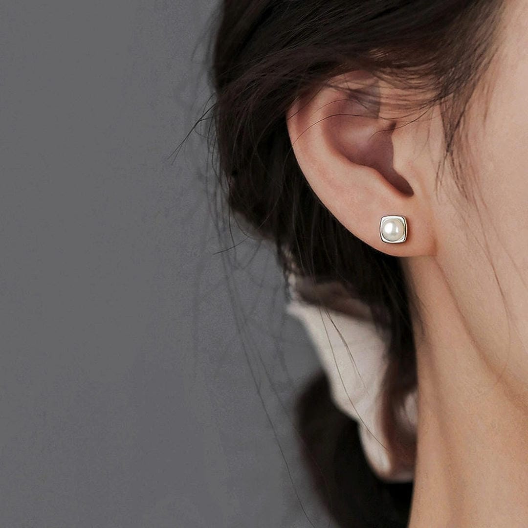 Pendientes de perlas con montura cuadrada