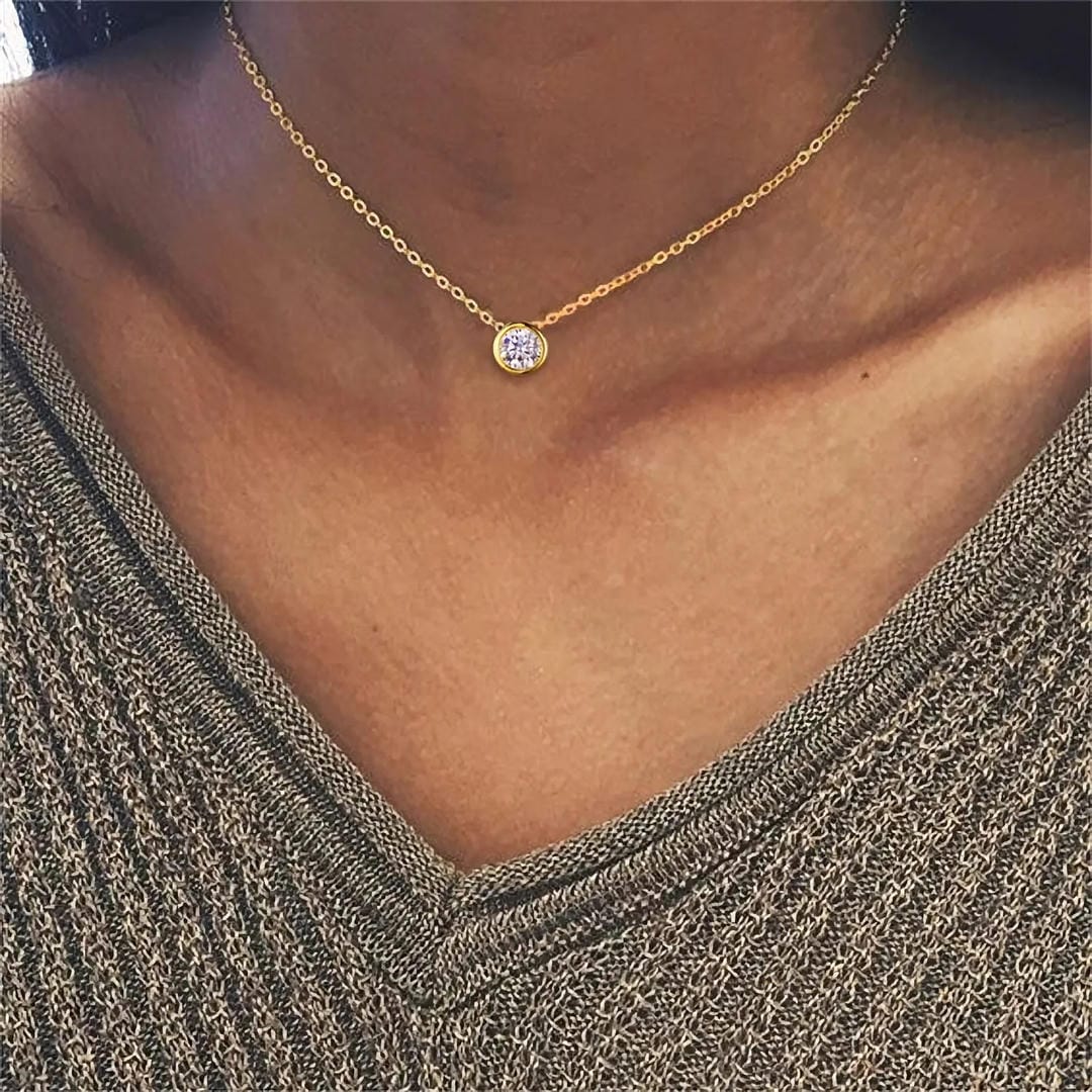 Cadena de oro con gema radiante