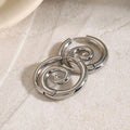 Pendientes atemporales de espiral dorada