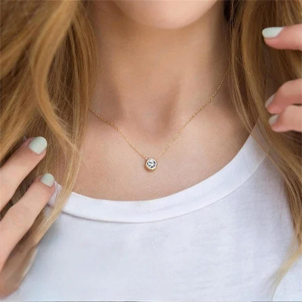 Cadena de oro con gema radiante