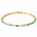 Pulsera de oro con circonitas y piedra turquesa