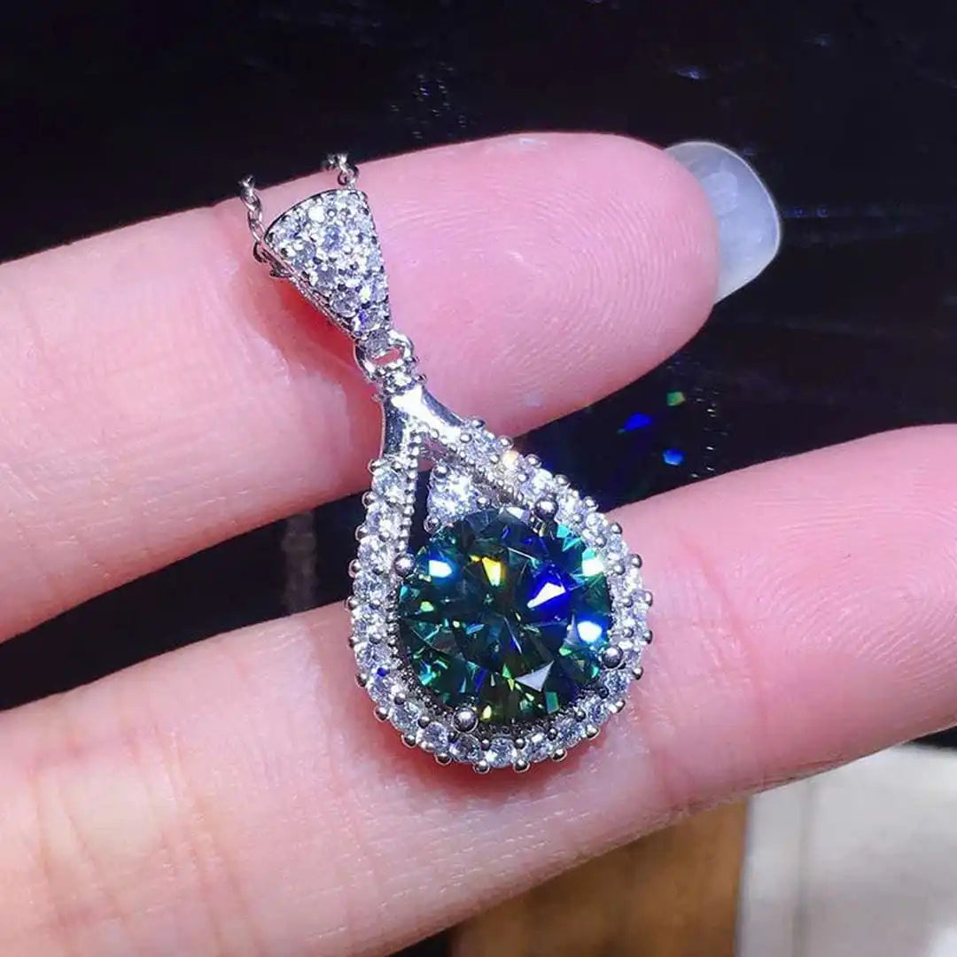 Pulsera rígida de lágrima esmeralda radiante