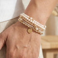 Pulsera con abalorios de crema costera